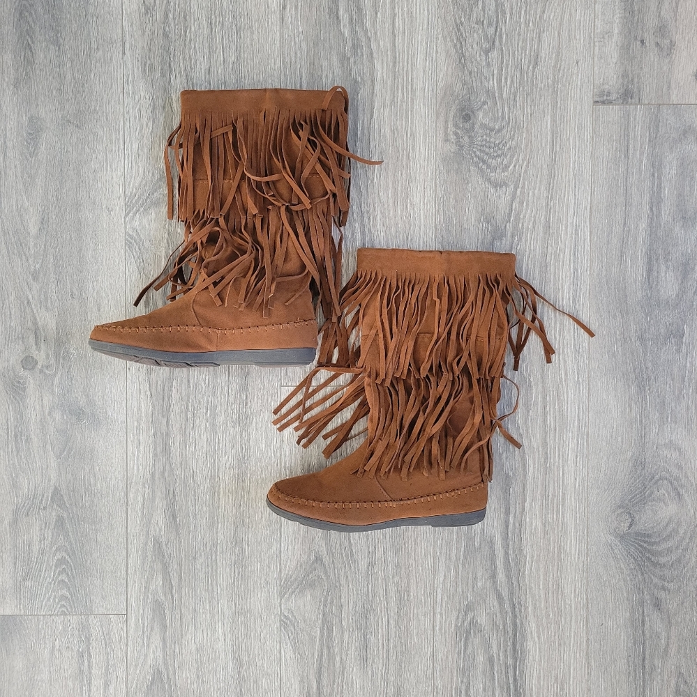 Moccasin style boots.